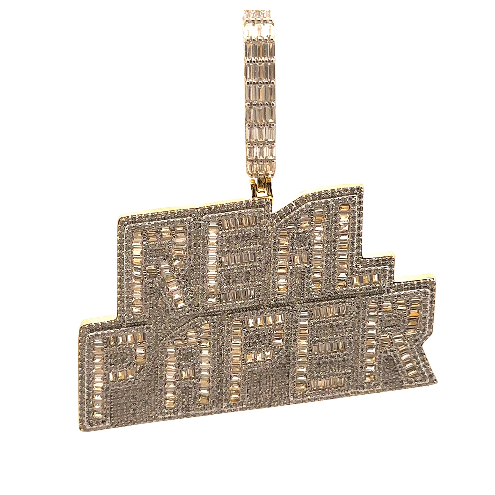 Close-up of gold iced out pendant with cubic zirconia stones, showcasing its brilliance.