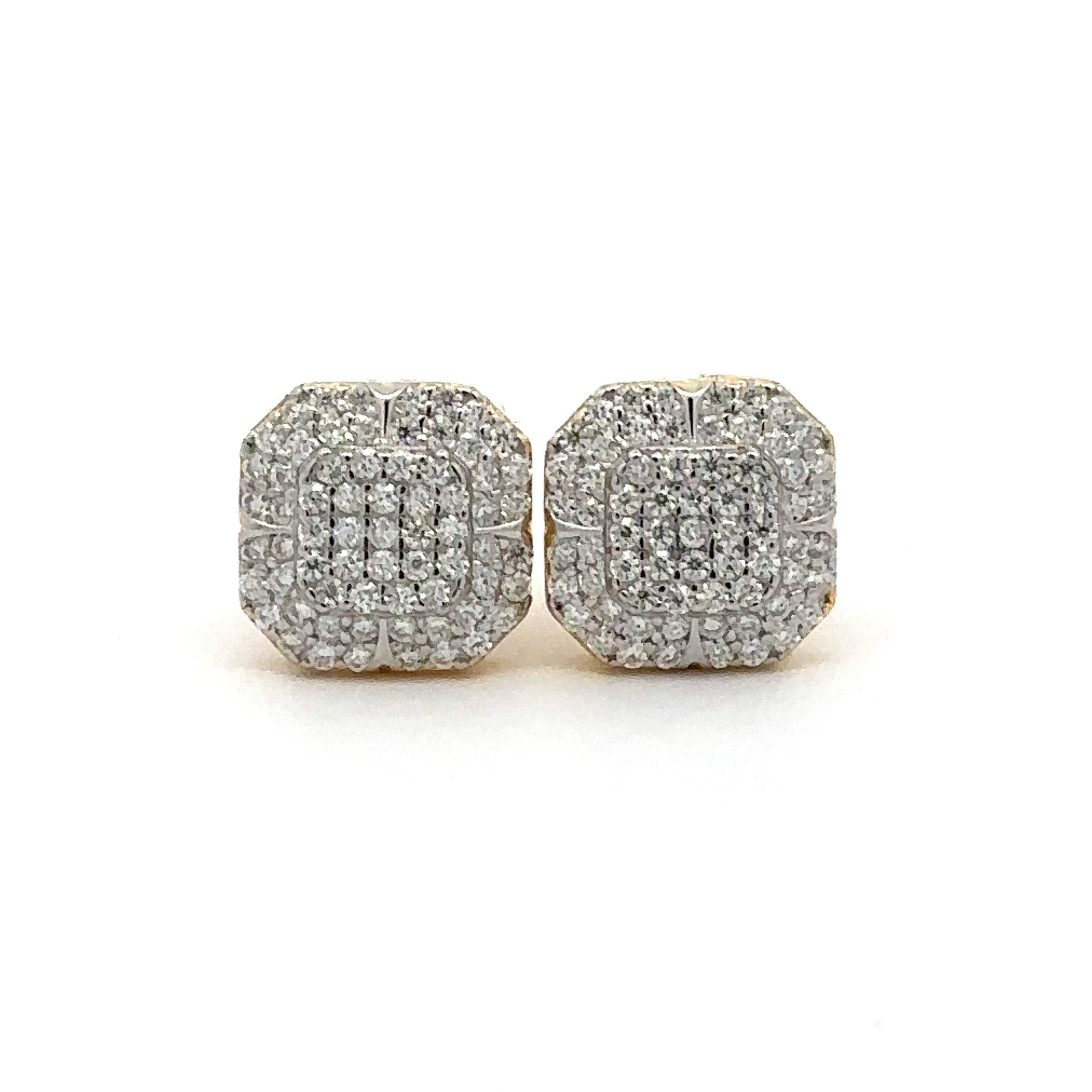 Close-up of moissanite earrings in 925 silver and gold showing the sparkling stones