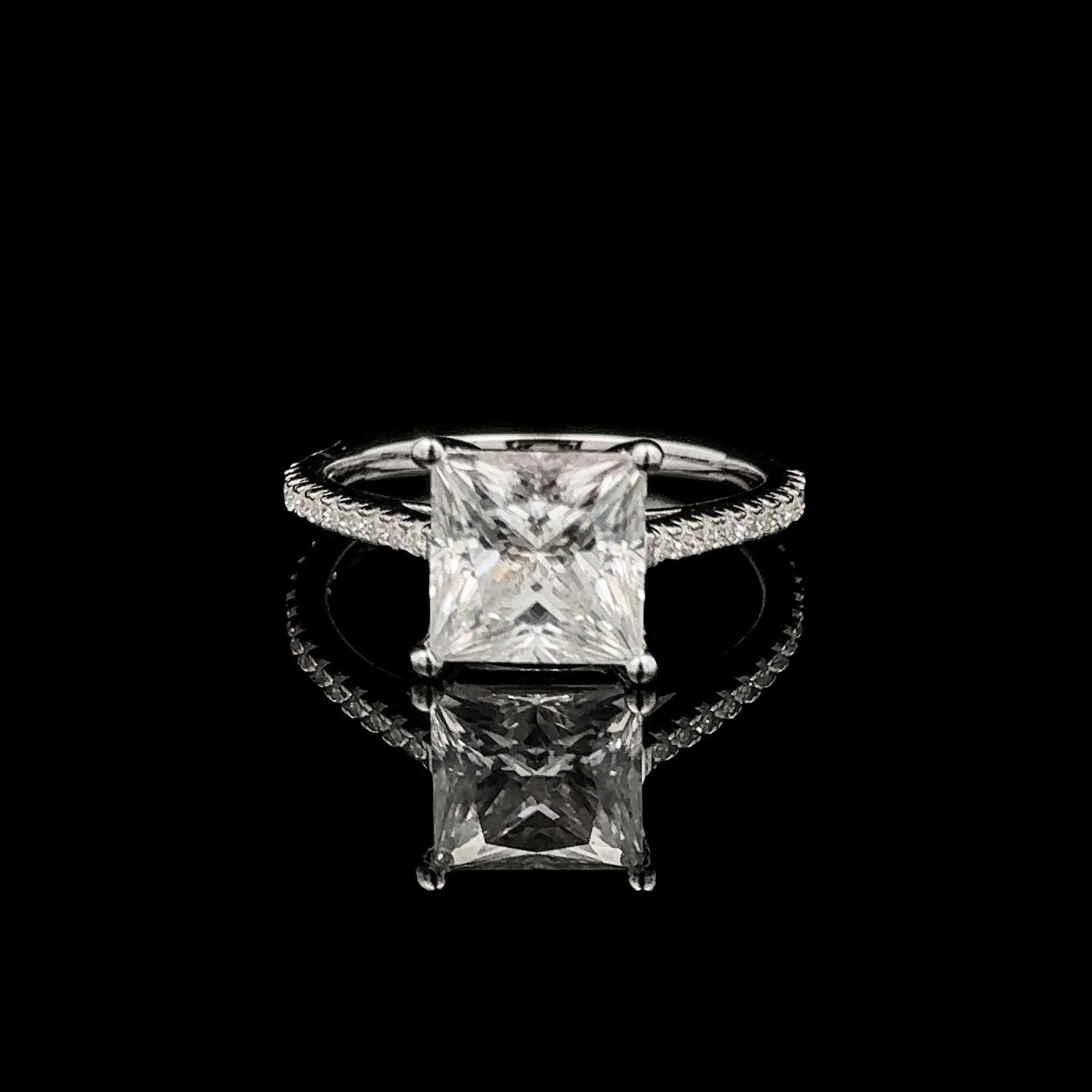 Princess cut moissanite ring in 925 silver showcasing its brilliance from a top view