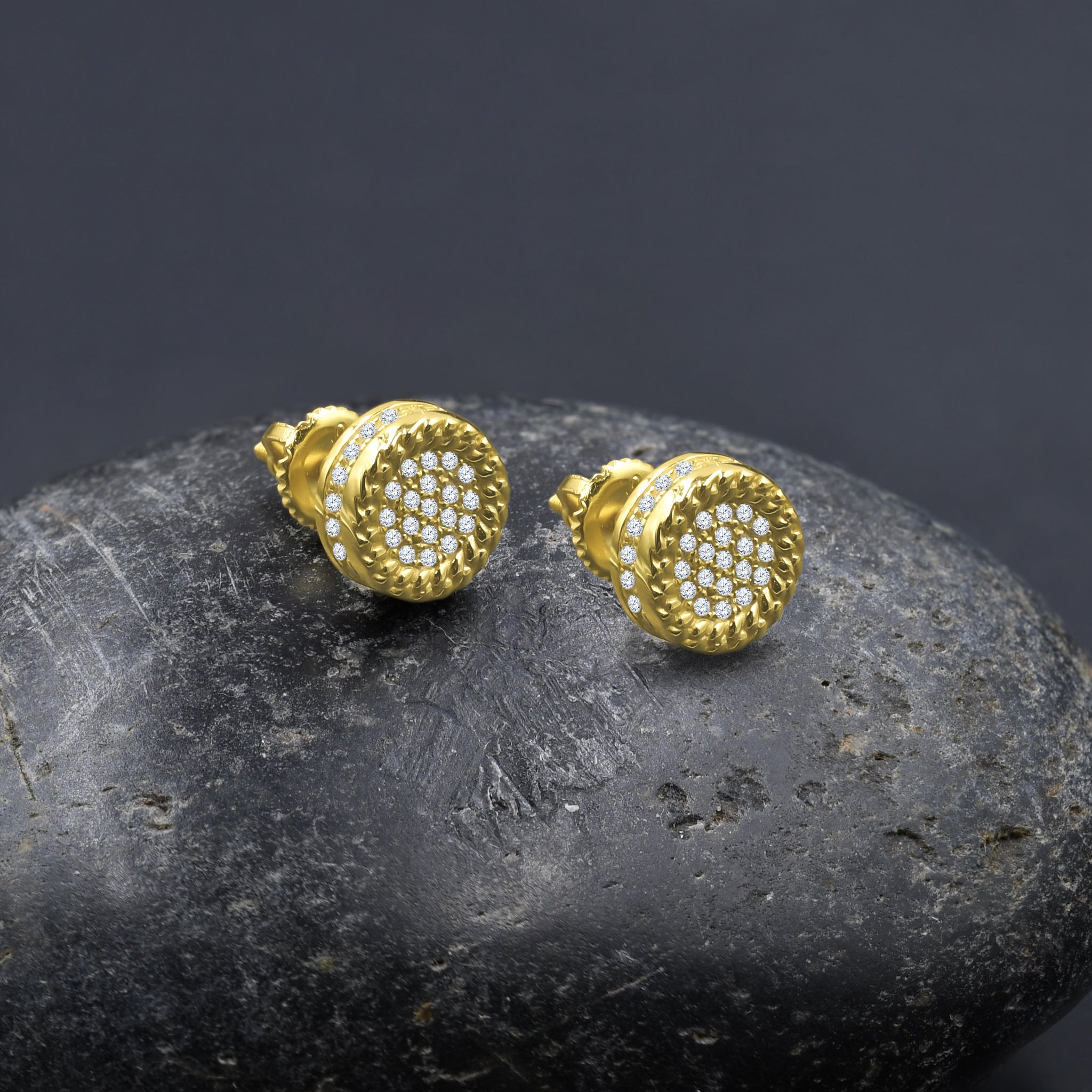 Elegant gold screw back earrings showcasing a minimalist design with cubic zirconia stones.