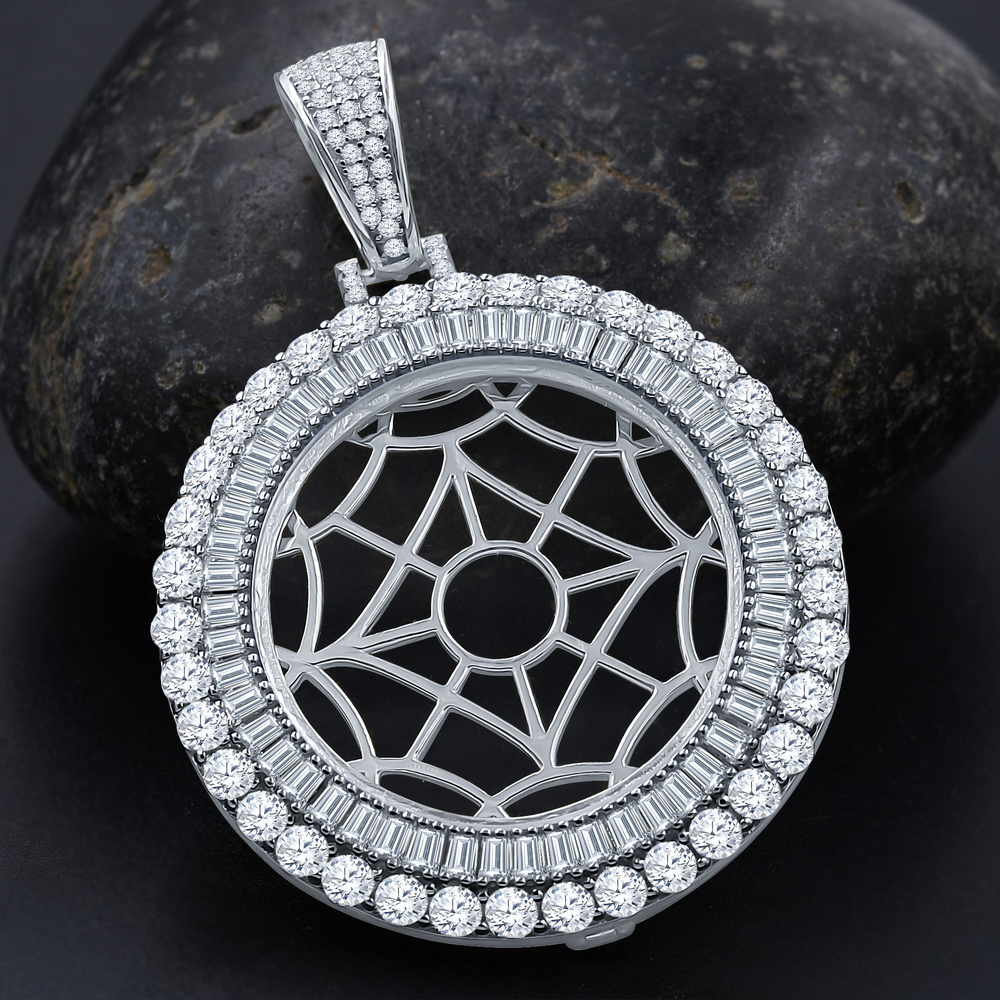 Close-up of the unique designer silver pendant with stones showing detailed craftsmanship