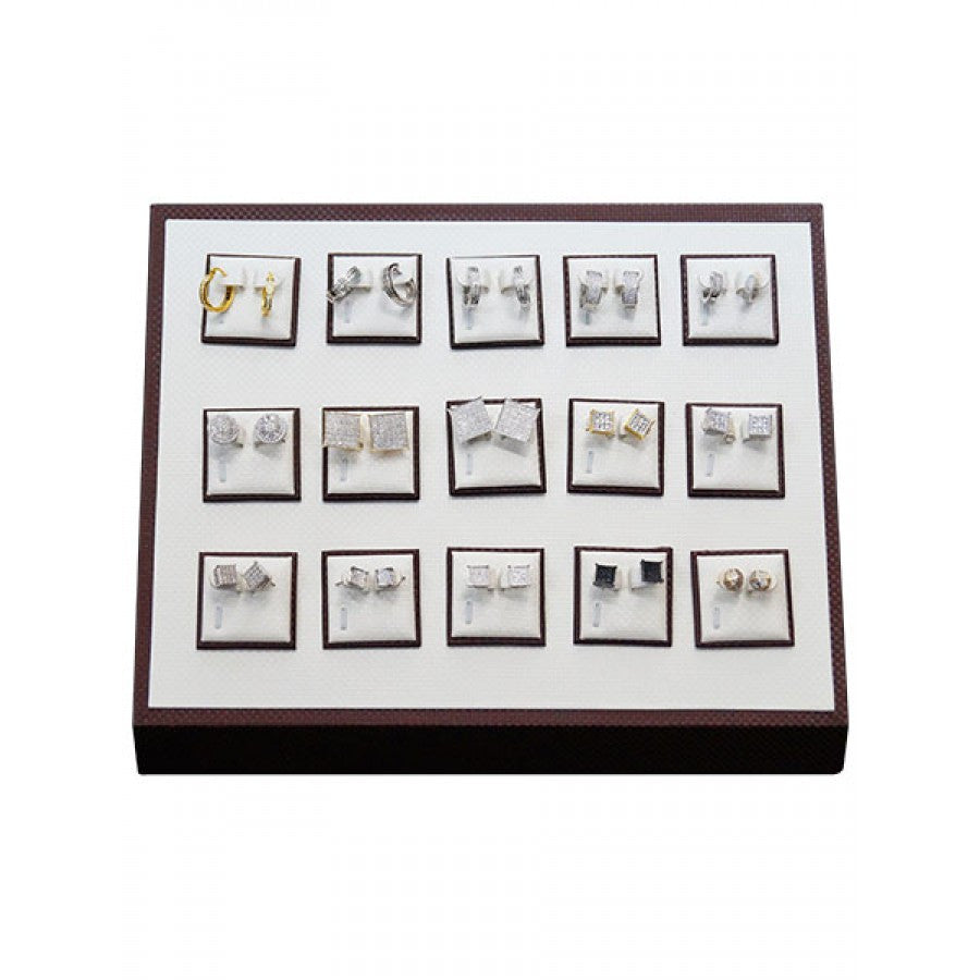 Close-up of magnetic pad for earrings on white jewelry display tray