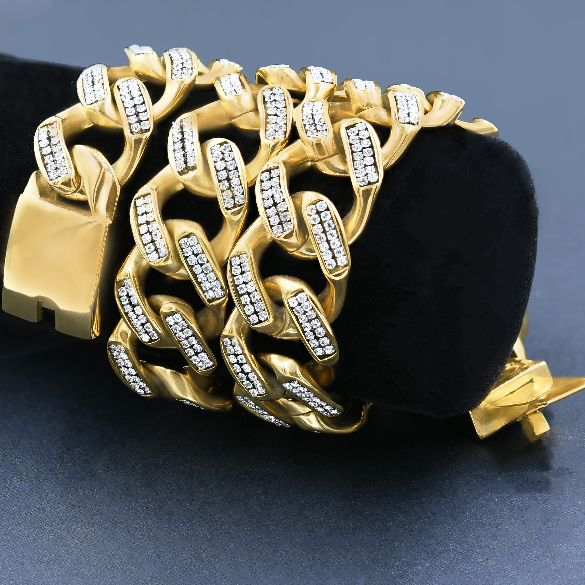 Close-up of stainless steel chain with cubic zirconia stones for elegance
